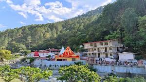 The serene Kainchi Dham temple surrounded by lush green hills, with the Kosi River flowing nearby. In the foreground, a portrait of Baba Neem Karori (Maharajji), radiating divine grace and presence, capturing the spiritual essence of the ashram