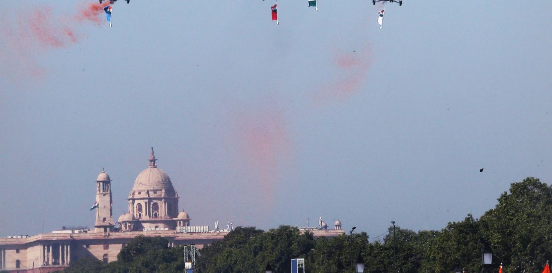 A vibrant Republic Day parade featuring colorful floats representing different states of India, adorned with cultural symbols, flowers, and traditional designs