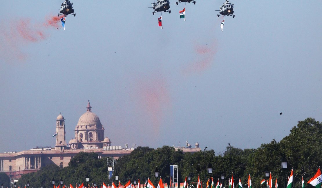 A vibrant Republic Day parade featuring colorful floats representing different states of India, adorned with cultural symbols, flowers, and traditional designs