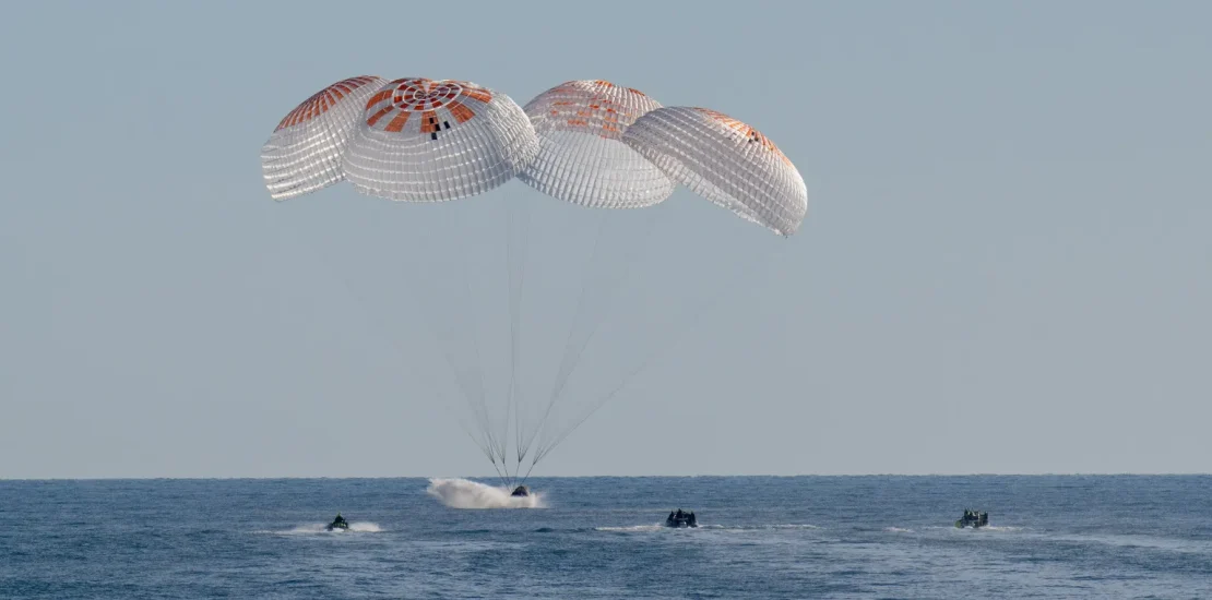 NASA astronauts Nick Hague, Suni Williams, Butch Wilmore, and Roscosmos cosmonaut Aleksandr Gorbunov land in a SpaceX Dragon spacecraft in the water off the coast of Tallahassee, Florida on March 18, 2025. Hague, Gorbunov, Williams, and Wilmore returned from a long-duration science expedition aboard the International Space Station. Credit: NASA/Keegan Barber