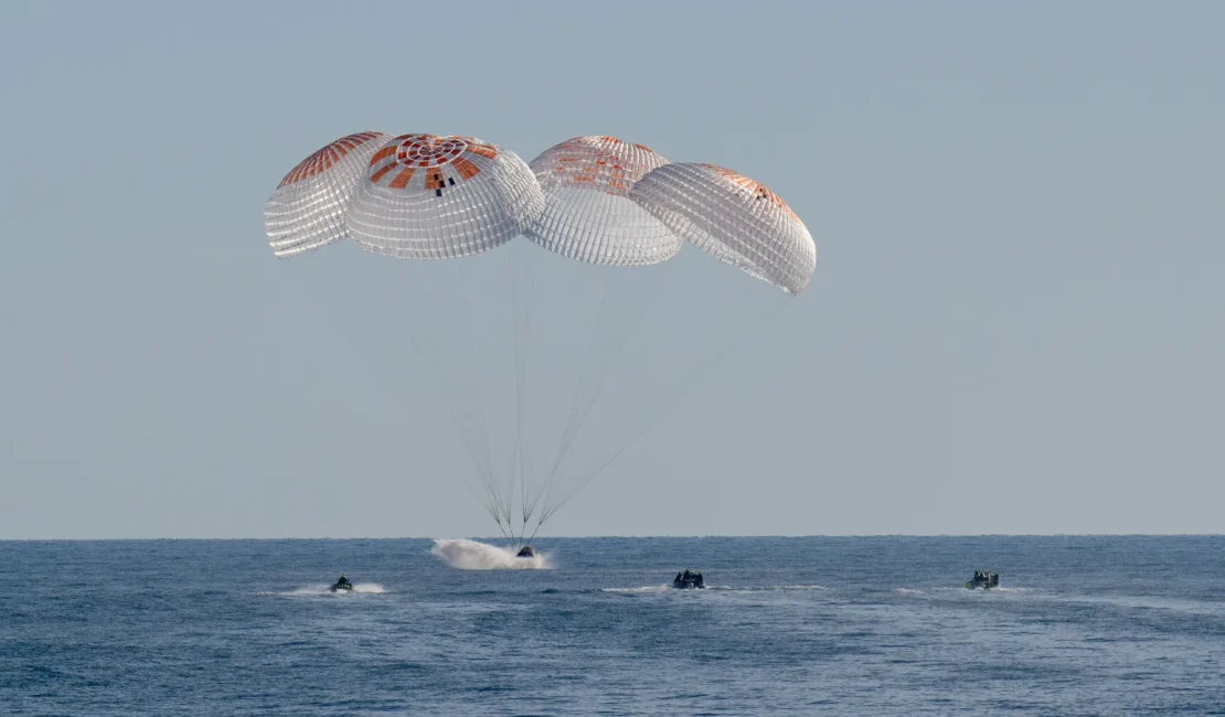 NASA astronauts Nick Hague, Suni Williams, Butch Wilmore, and Roscosmos cosmonaut Aleksandr Gorbunov land in a SpaceX Dragon spacecraft in the water off the coast of Tallahassee, Florida on March 18, 2025. Hague, Gorbunov, Williams, and Wilmore returned from a long-duration science expedition aboard the International Space Station. Credit: NASA/Keegan Barber